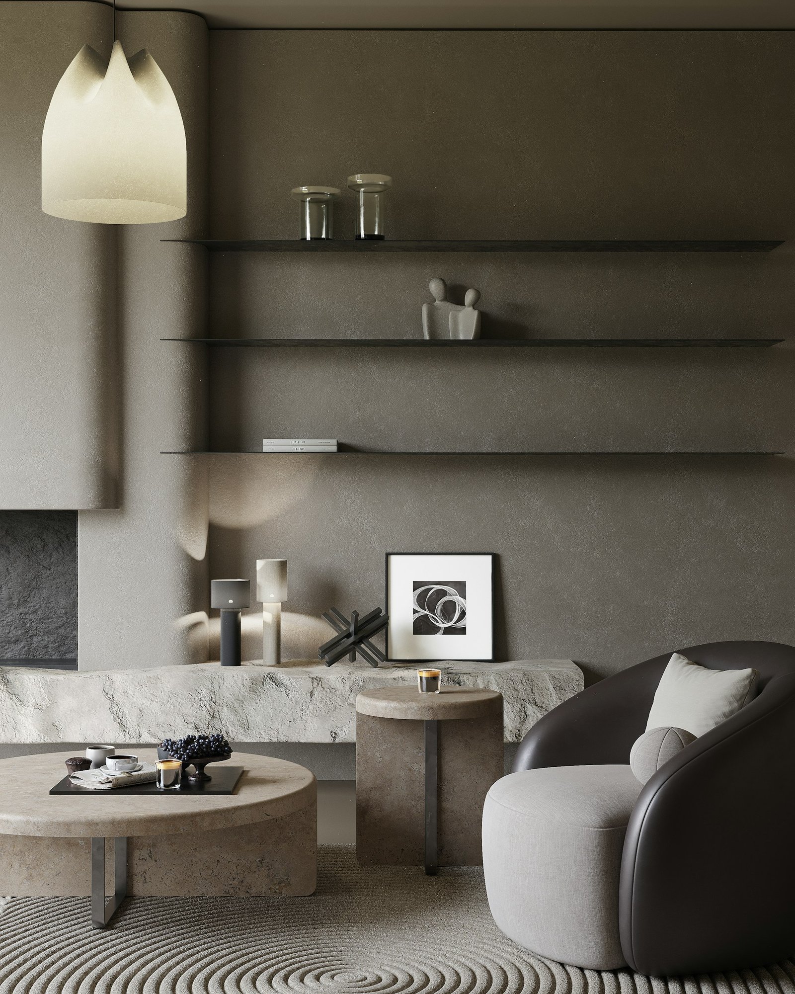A modern living room with a curved cream sofa, round coffee table, sculptural lamp, and soft neutral colors.